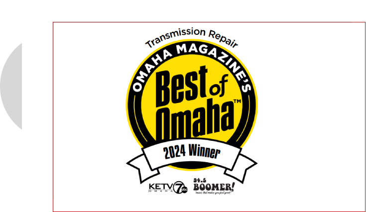 A yellow and black logo for the best of omaha transmission repair.